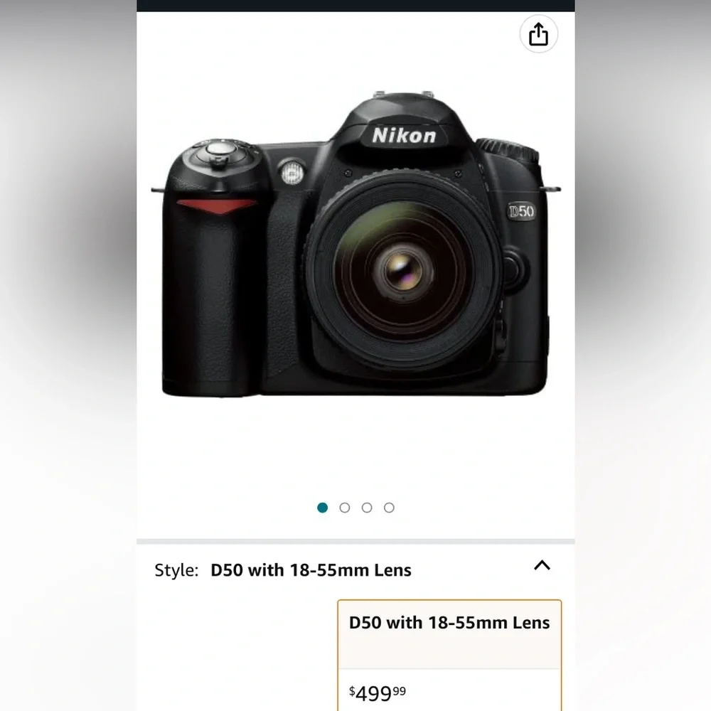 Nikon D50 digital camera with accessories, and extra battery packs.